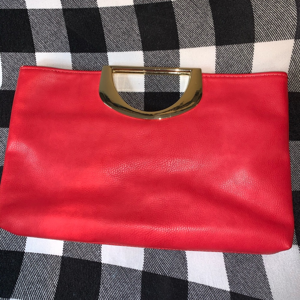 Coral clutch with gold handle